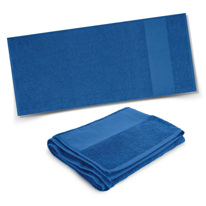 A blue Marina Terry Towel displayed flat and folded, featuring a textured surface and a smooth panel.