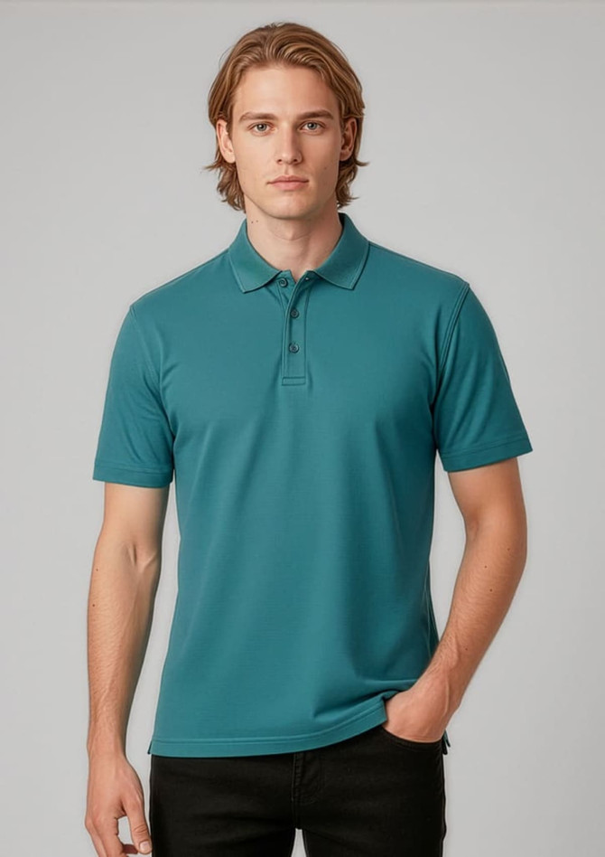 A teal men's polo shirt with a collar, featuring a logo on the chest. The model is wearing black pants.