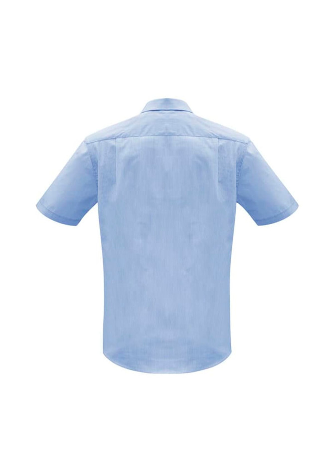 A light blue short sleeve button-up shirt with a back yoke and collar. Features a logo on the upper back.