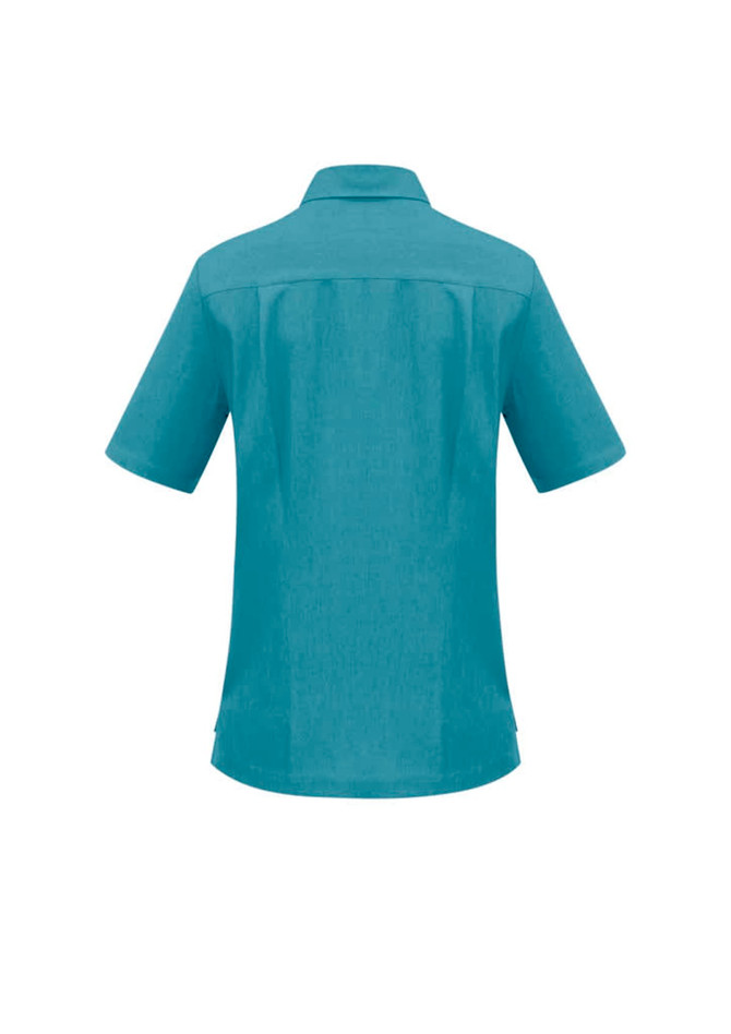 A teal ladies overblouse featuring a collared neck and short sleeves, with a logo on the back.
