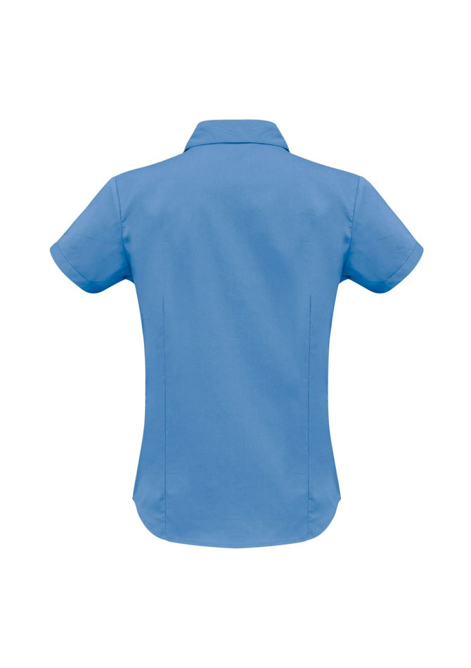 A women's short sleeve button-up shirt in a light blue colour, featuring a collar and a branded logo.