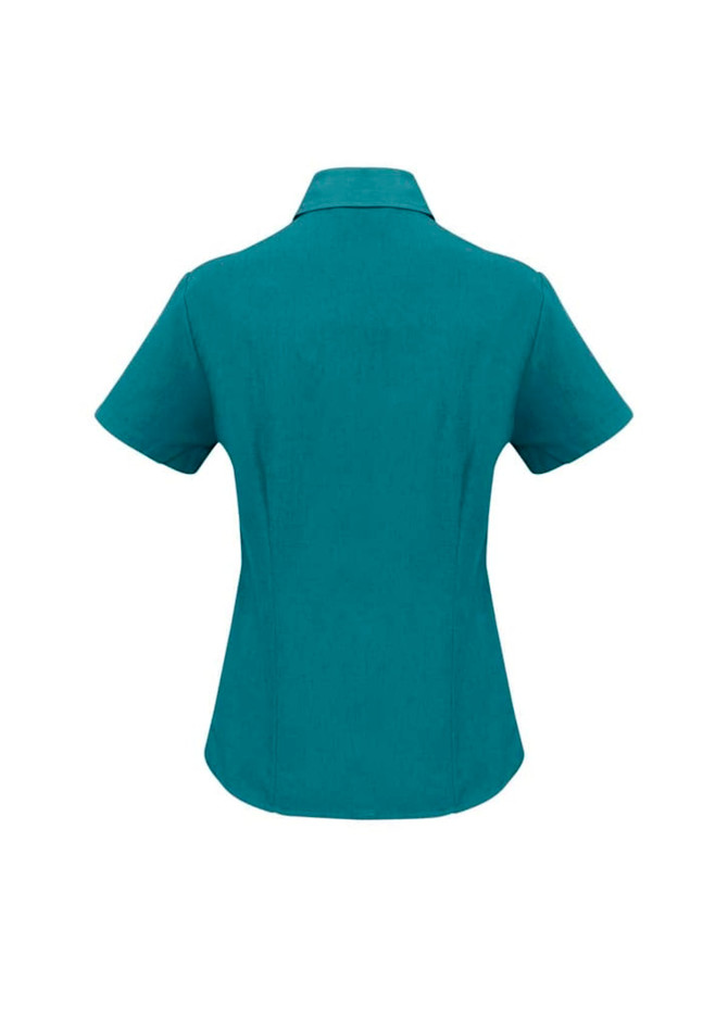 A plain short sleeve button-up shirt in teal, featuring a collared neck and a logo on the back.