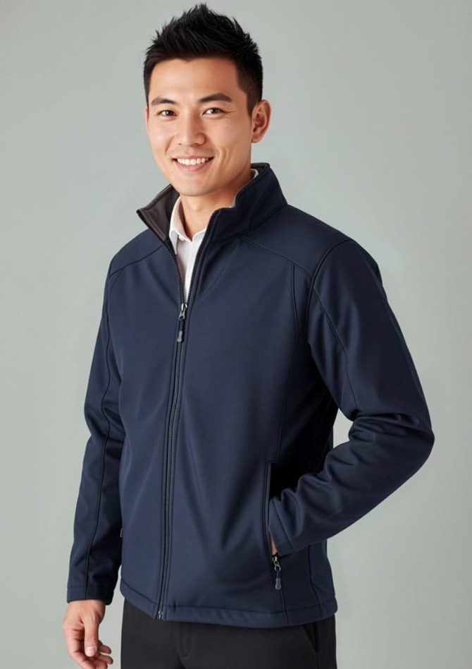 A navy soft shell jacket for men featuring a zip front, high collar, and side pockets. Includes a branding logo.