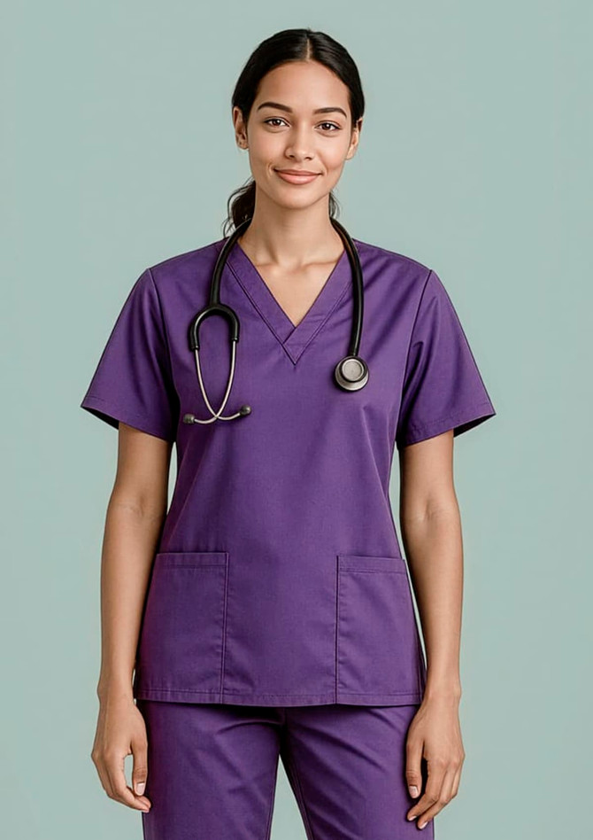 A purple women's scrub top with short sleeves and a V-neck, featuring pockets and a stethoscope.
