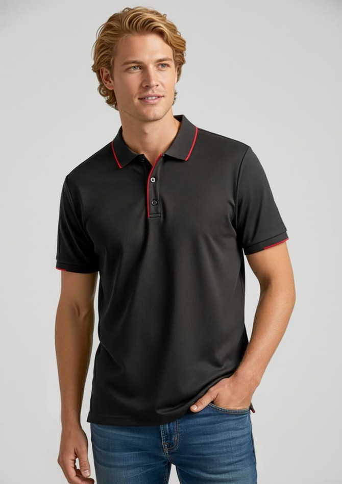A black short sleeve polo shirt with red accents and a logo, worn by a model.