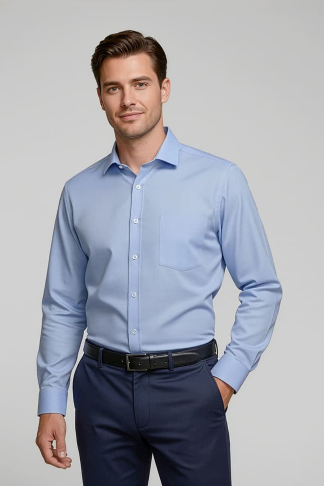 A light blue long-sleeve button-up shirt for men, featuring a chest pocket and a neat collar. It has a logo.