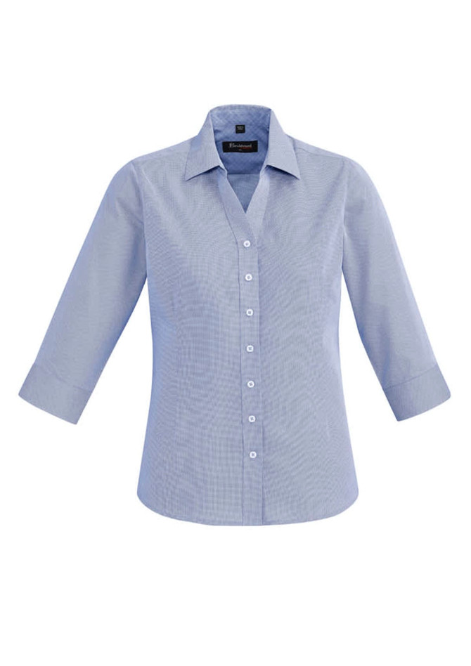 A light blue, 3/4 sleeve button-up shirt with a collar and a logo on the chest.