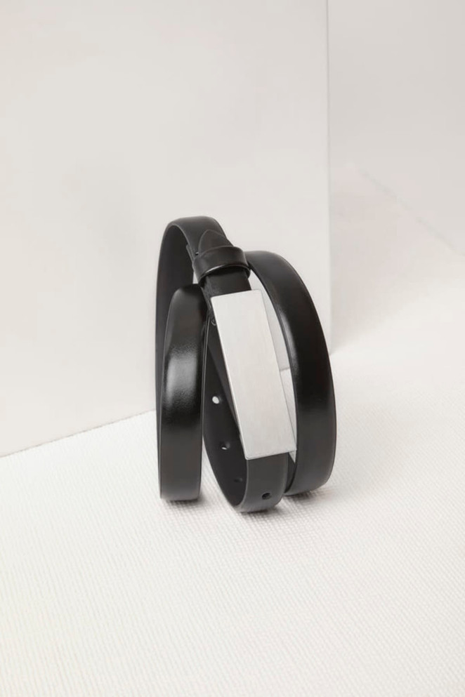A black leather belt with a sleek metal buckle, featuring a minimalist design and smooth finish.