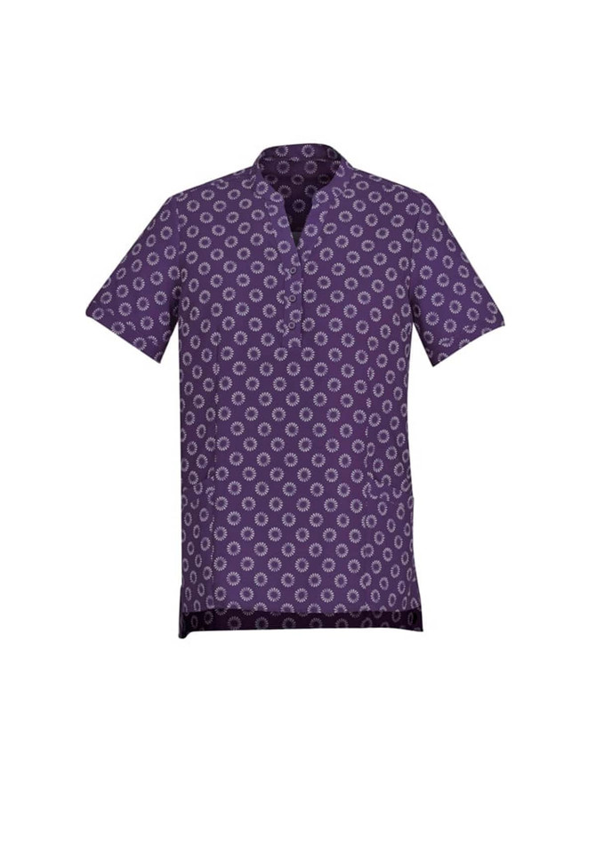 A purple tunic featuring a white daisy print, designed with short sleeves and a collar. It has pockets and a logo.