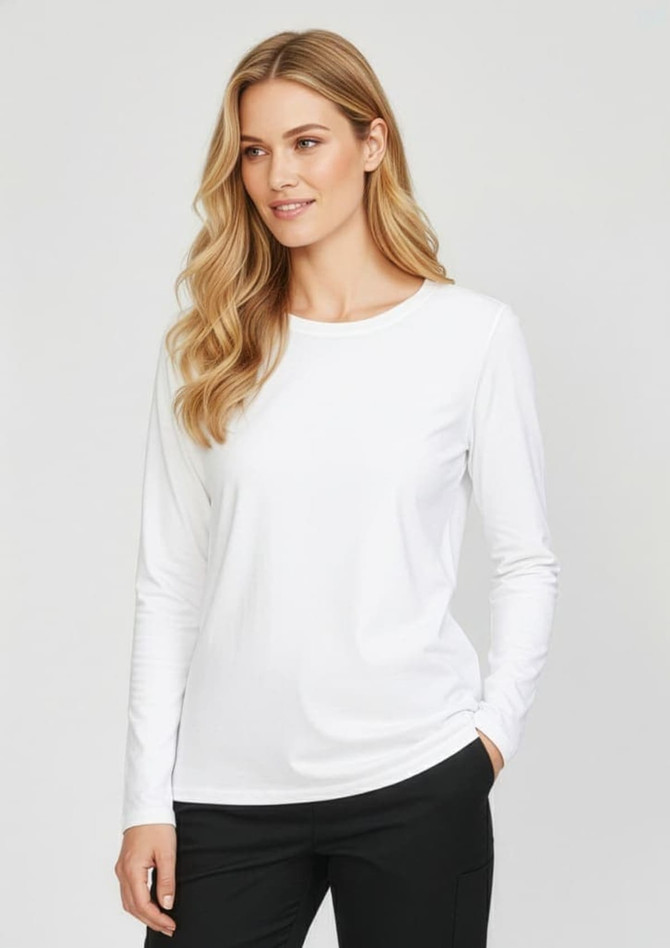 A long sleeve white performance tee for women, featuring a crew neck and a fitted design. 
