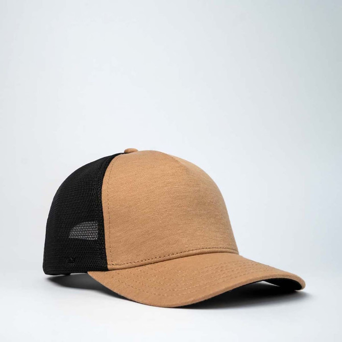 A tan and black trucker cap with a mesh back and a curved brim, featuring a logo on the front.