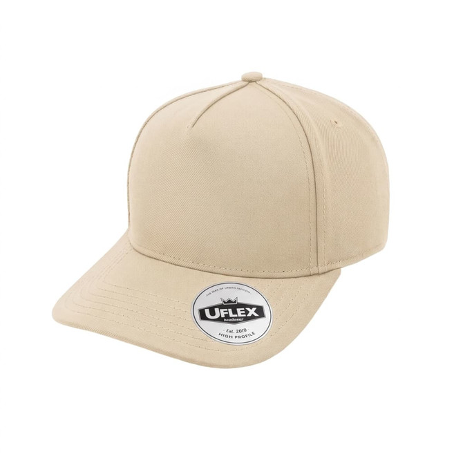 A beige high-profile 5-panel snapback cap with branding, featuring a curved peak and a structured design.