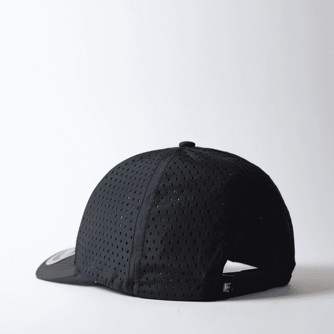 A black high-tech curved peak snapback cap with perforated design and an adjustable snapback closure.