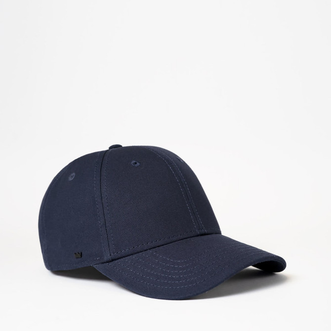 A navy blue six-panel recycled cotton baseball cap with a logo on the side.