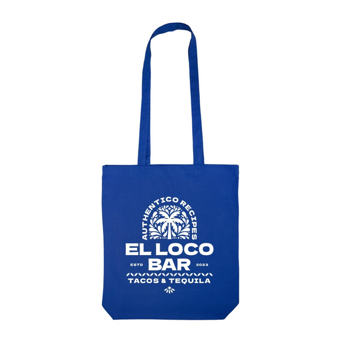 A blue tote bag with long handles and a logo, featuring a white design related to tacos and tequila.