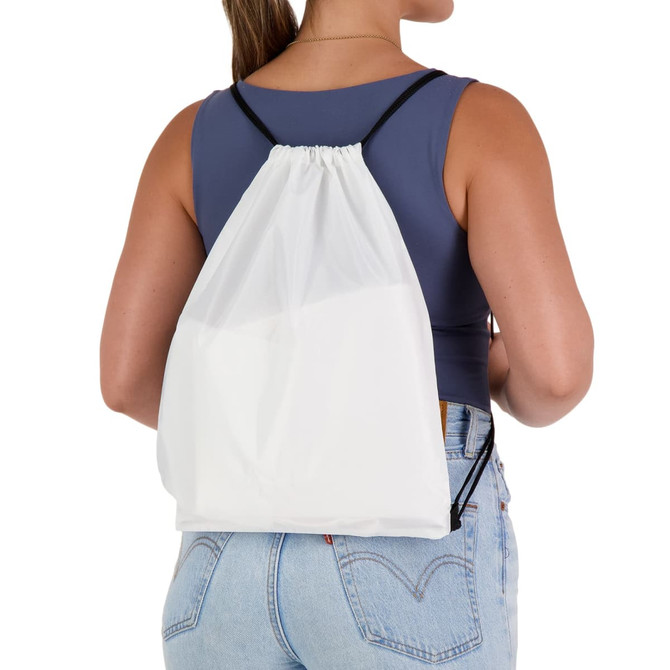 A white drawstring backpack is worn by a person, featuring black straps and a simple design.