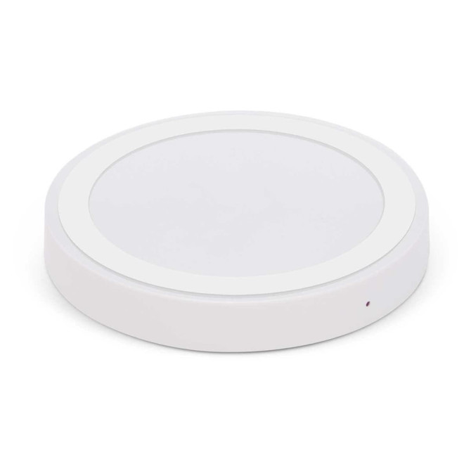 A circular white wireless charger with a smooth surface and a small indicator light.