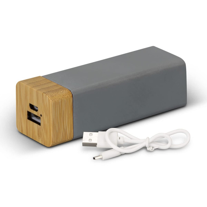 A grey power bank with a bamboo end, accompanied by a white USB cable, featuring a logo.