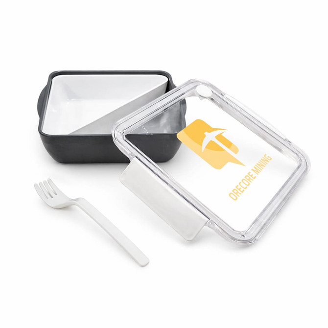 A black and white lunch box with a transparent lid and a fork, featuring a logo on the lid.