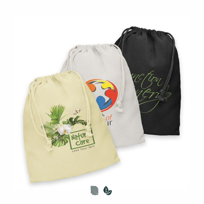 Three large cotton gift bags in yellow, cream, and black, featuring logos and drawstring closures.
