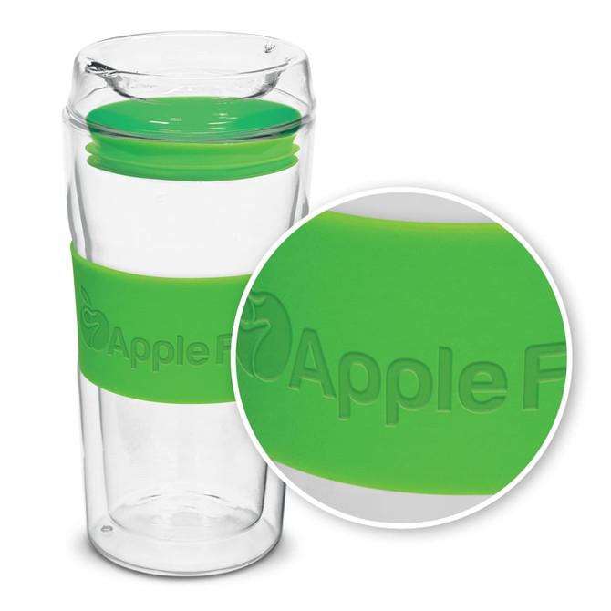 A double wall glass cup with a green silicone grip, featuring a logo and a clear design.