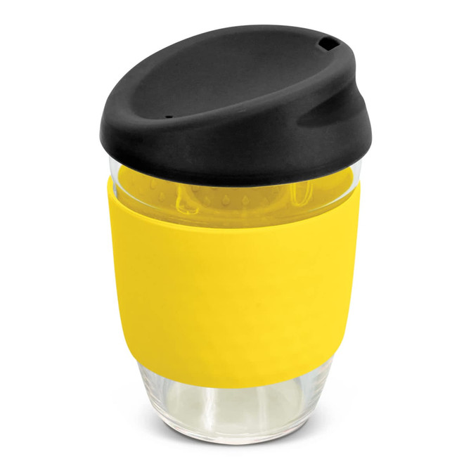 A drink bottle made of borosilicate glass with a yellow silicone sleeve and a black lid.