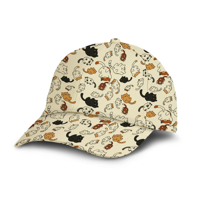 A cap featuring a cream background adorned with various playful cat patterns in multiple colours, including black, white, and orange.