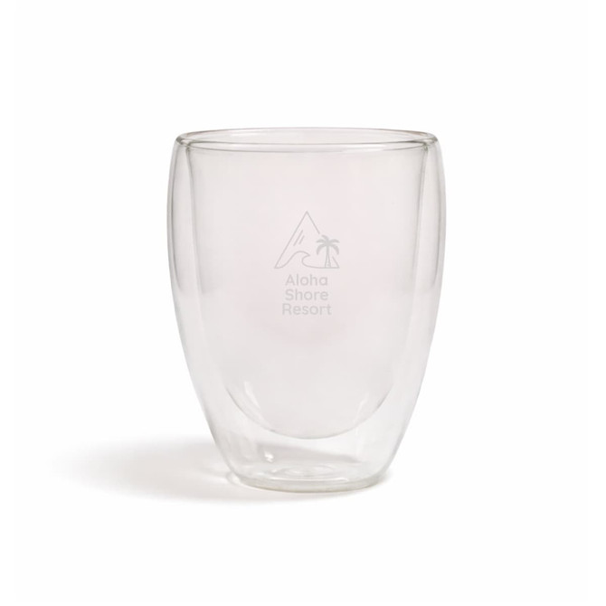 A double wall glass cup in a transparent design with a branding logo on the side.