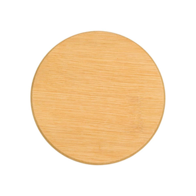 A round bamboo coaster with a smooth, natural finish. It features a simple design and light tan colour.