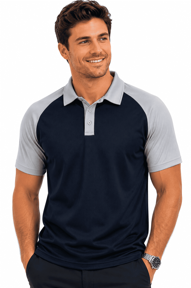 A navy and grey polo shirt featuring a collar and short sleeves, worn by a smiling man. The shirt has a logo.