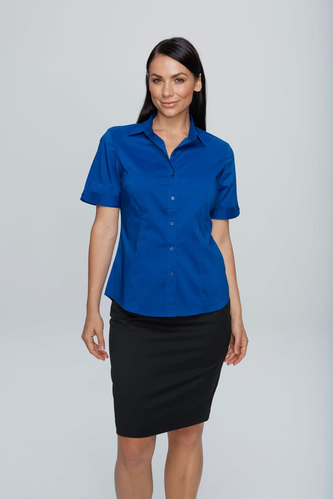 A blue short sleeve button-up shirt is displayed, featuring a collar and a fitted design, worn with a black skirt.