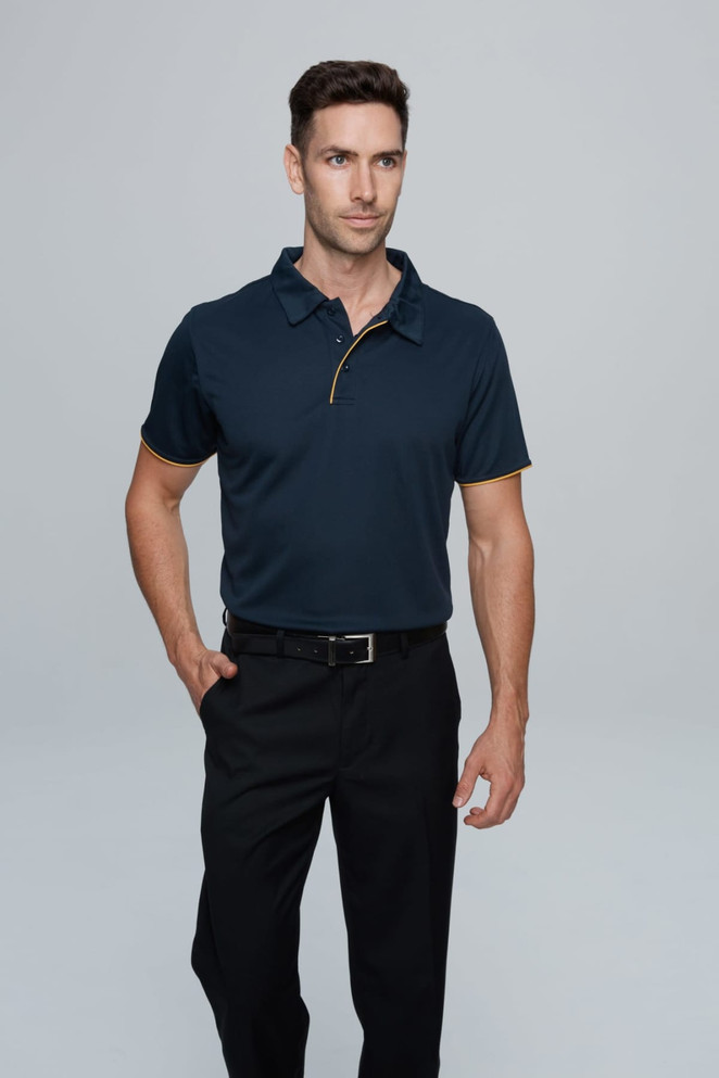 A navy polo shirt with a collar, featuring a logo, worn by a man paired with black trousers.