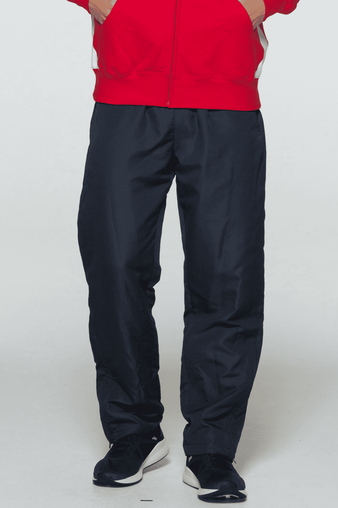 Navy track pants with a loose fit, featuring an elastic waistband and pockets, paired with a red hoodie.