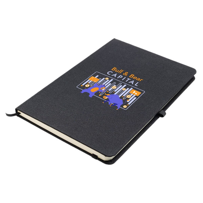 A black A5 notebook with a logo on the cover and an elastic band closure.