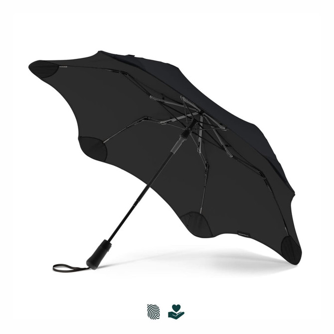 A black umbrella with a unique design and a sturdy handle. It features a logo on the handle.