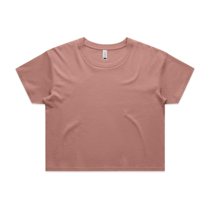 A crop tee in a muted pink colour with a rounded neckline and short sleeves. Features a logo on the label.