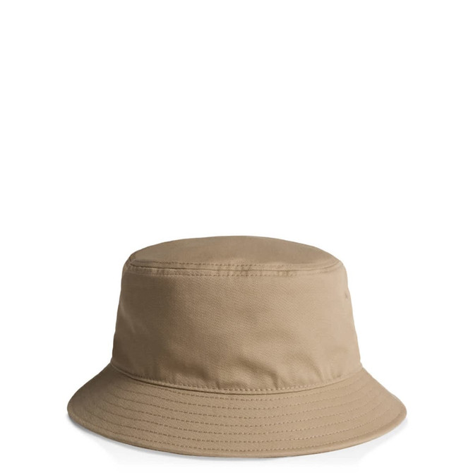 A tan bucket hat with a wide brim and a fabric texture, featuring a small logo on the side.