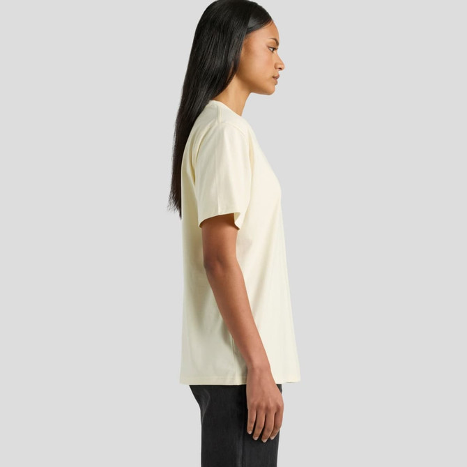 A side view of a cream-coloured t-shirt with a relaxed fit, featuring a logo on the front.