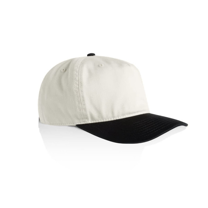 A two-tone cap featuring a cream crown and a black peak, with a logo on the front.