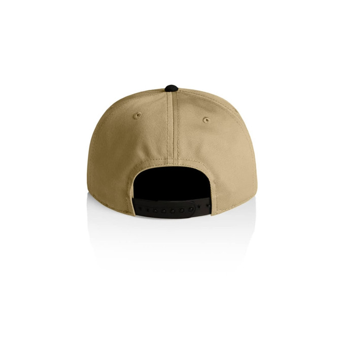 A two-tone cap featuring a tan fabric with a black visor and adjustable strap at the back.