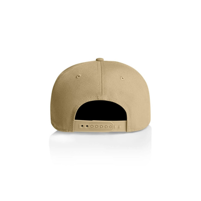 A tan cap with a snapback closure, featuring a smooth texture and ventilation holes. The inside is mostly black.