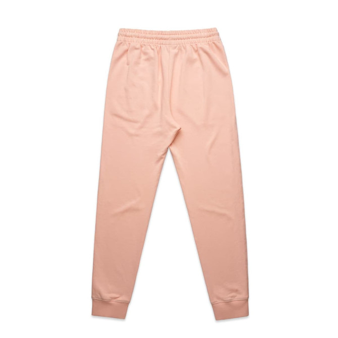 Peach-coloured track pants with an elastic waistband and fitted cuffs, featuring a logo.