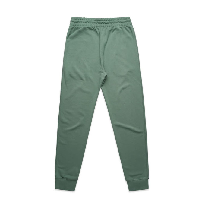 Track pants in a soft green colour with an elastic waistband and cuffs, featuring a logo on the waistband. Track pants in a soft green colour with an elastic waistband and cuffs, featuring a logo on the waistband.