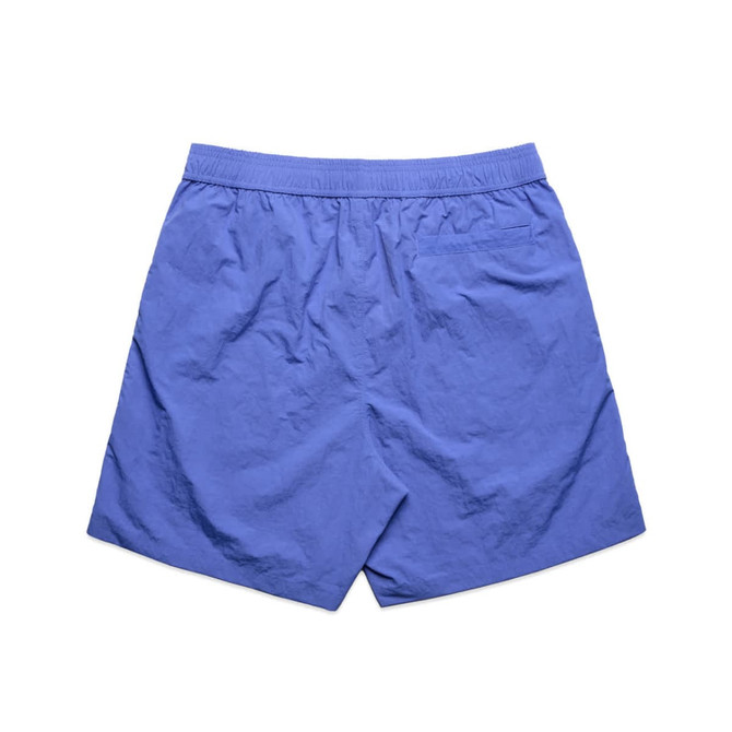 A pair of blue swim shorts with an elastic waistband and a back pocket, featuring a logo.