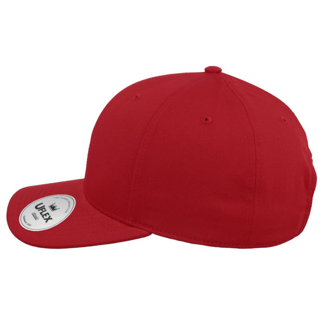 A red UFlex Classic 6 Panel Cap with a curved peak and a logo on the side.