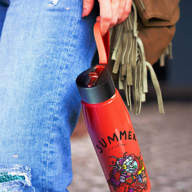 A drink bottle in vibrant red, featuring a black lid and a handle, with an artistic design on its surface.