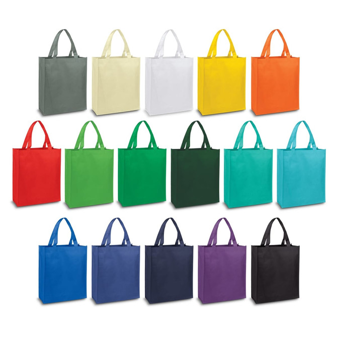 A collection of Kira A4 tote bags in various colours, including grey, white, yellow, green, blue, and black, with handles.