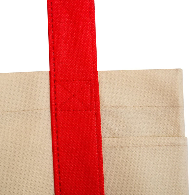 A reusable grocery bag in beige with a bright red handle, featuring a pocket and a branding logo.
