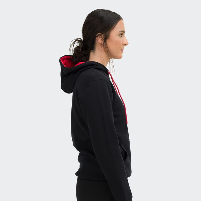 A unisex hoodie in black with a red contrast hood, featuring a logo on the front.