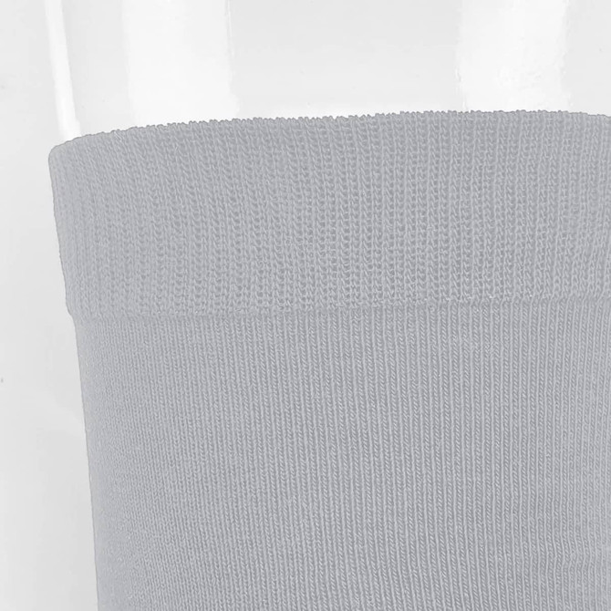A grey sock featuring a textured cuff and a smooth body, with a logo present.